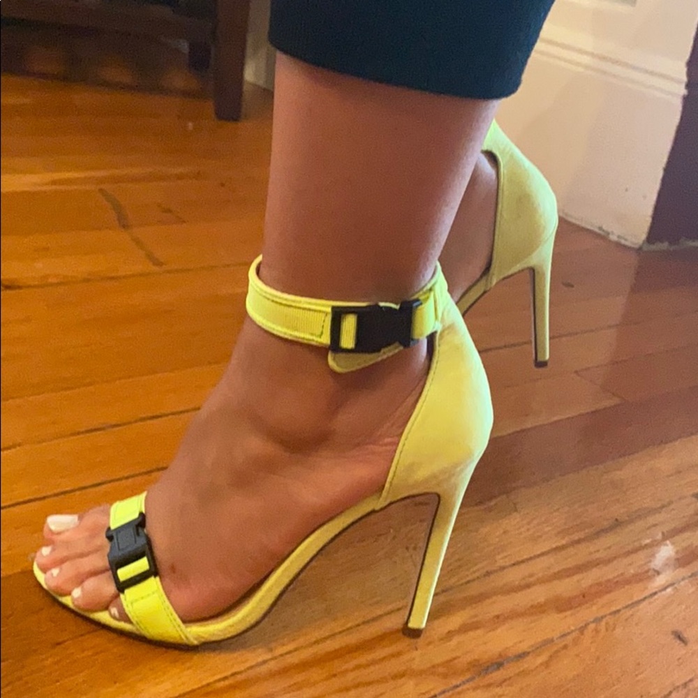 Green strapped heels.